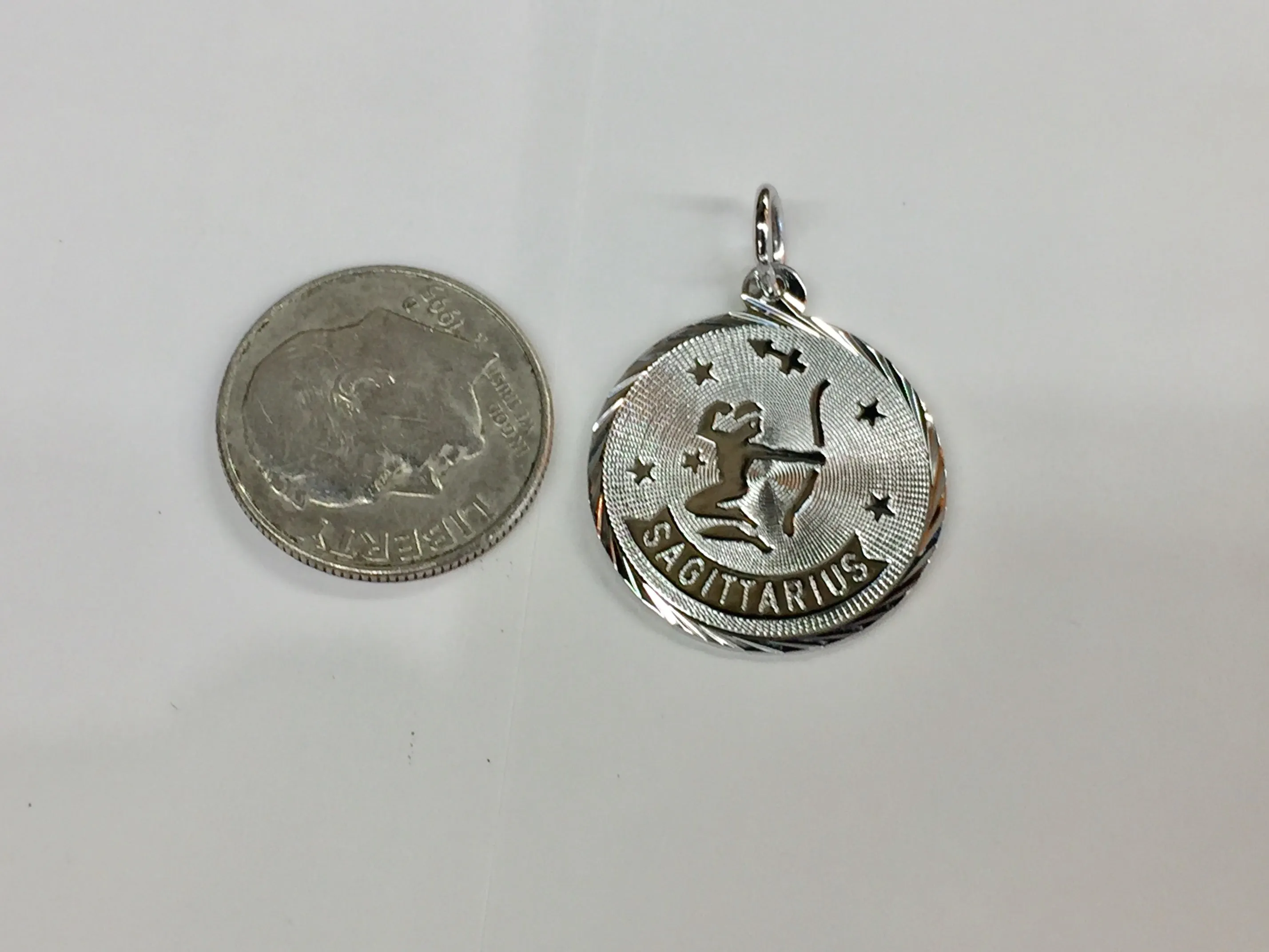 Sagittarius Silver Charm