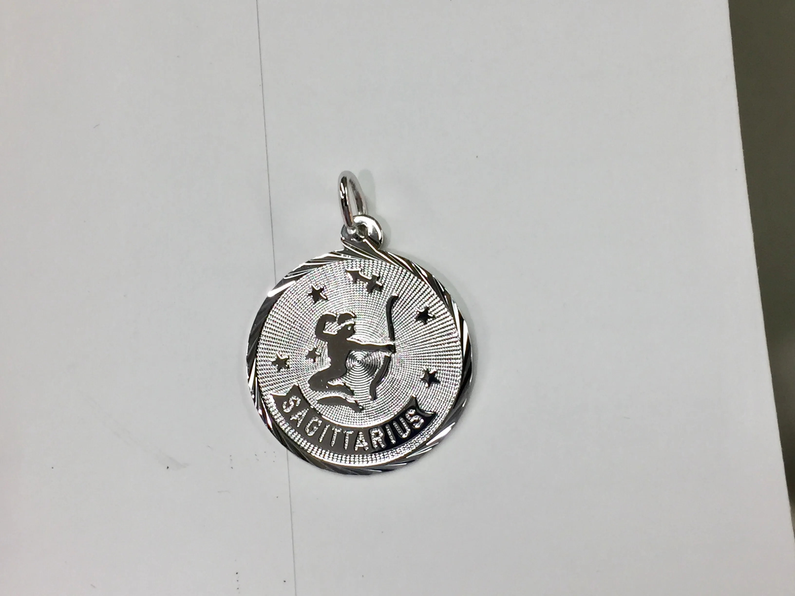 Sagittarius Silver Charm